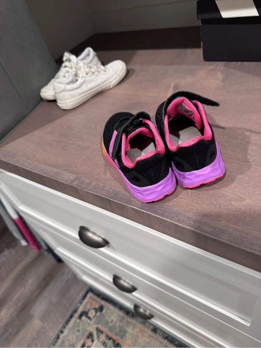 New Balance Black Sneakers with Pink and Orange Accents